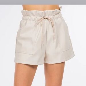 Beige leather shorts, size L